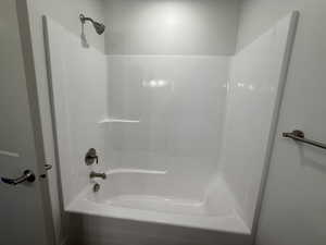 Bathroom featuring shower / bath combination