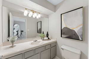 Bathroom with toilet and vanity