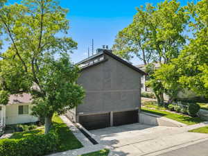 Garage featuring driveway