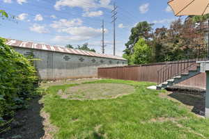 View of yard with stairway