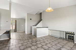 Unfurnished room featuring baseboards