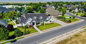 Aerial perspective of suburban area with a mountain backdrop
