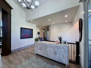 large open Foyer with railing toward basement