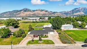 Aerial perspective of suburban area with a mountain backdrop