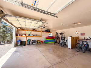 Garage featuring a garage door opener