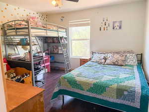 Bedroom with wood finished floors