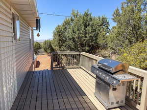 Deck featuring a grill