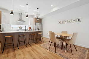 Chefs Kitchen, exterior vented range hood, gas range and refrigerator included.