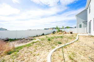 View of fenced backyard