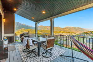 Deck off kitchen, dining room with mountain views
