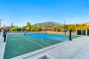 View of sport court with community basketball court and a mountain view