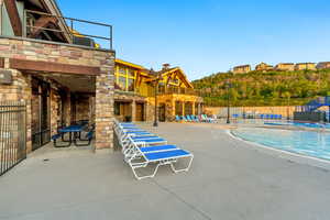 Community pool featuring a patio area