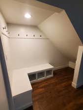 Mudroom featuring lofted ceiling, wood finished floors, baseboards, and recessed lighting