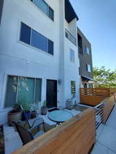 Back of property with stucco siding