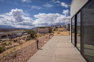 View of patio / terrace with a mountain view