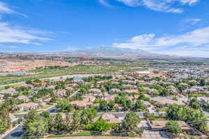 Aerial view of residential area with a mountain backdrop
