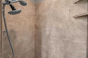 Bathroom view of a tile shower