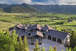 View of subject property with mountains