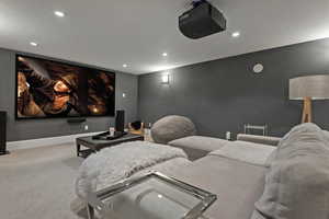 Home theater room with carpet floors, recessed lighting, and baseboards