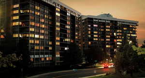 View of property at dusk
