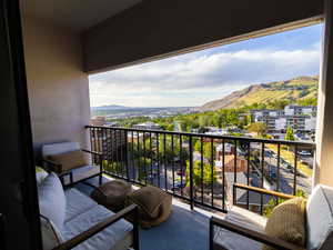 Balcony with a mountain view and outdoor lounge area