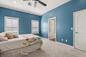 Carpeted bedroom featuring baseboards, a ceiling fan, and recessed lighting