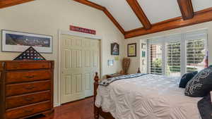 Bedroom with dark wood finished floors