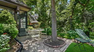 View of patio with outdoor dining space