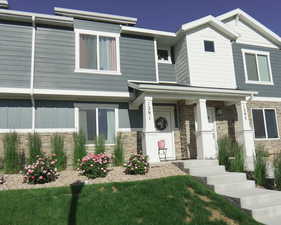 View of front of home with stone siding