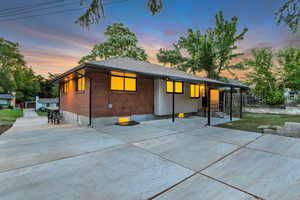 View of front of home featuring brick siding
