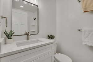 Bathroom with toilet and vanity
