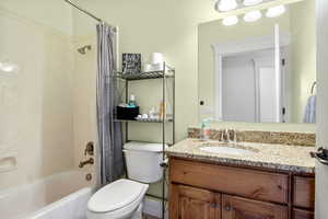 Hall bathroom with tub/shower combo.  Bathroom located next to Bedroom 1 and Bedroom 2