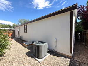 View of home's exterior featuring central AC unit
