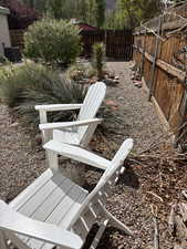 Fenced backyard with central AC