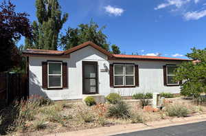 View of front facade featuring metal roof