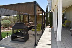 Wooden terrace with outdoor lounge area
