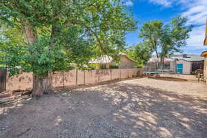 Fenced yard with a trampoline