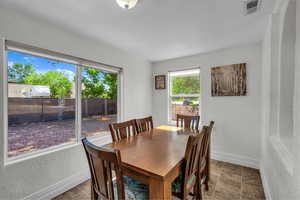 Dining area featuring baseboards