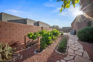 View of fenced backyard