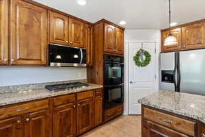 What's this?! Another pantry and a good sized one! Plus double ovens and a new gas range!