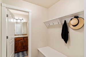 And a mudroom with coat and backpack hooks