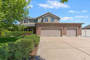 3 Car garage with the far bay being double deep facilitating 2 smaller cars in tandem or a great workshop area.