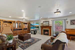 A very large and yet cozy room with windows out to the garden and yard plus an inviting gas fireplace. Big enough for the biggest of sectionals and love sacs!
