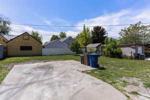 View of patio with an outbuilding