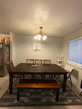 Dining space with a chandelier
