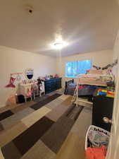 Bedroom with carpet flooring