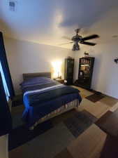 Bedroom featuring a ceiling fan