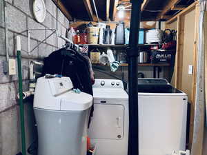 Washroom with washing machine and dryer