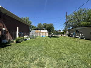 View of yard with a trampoline