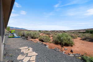 View of yard with a mountain view